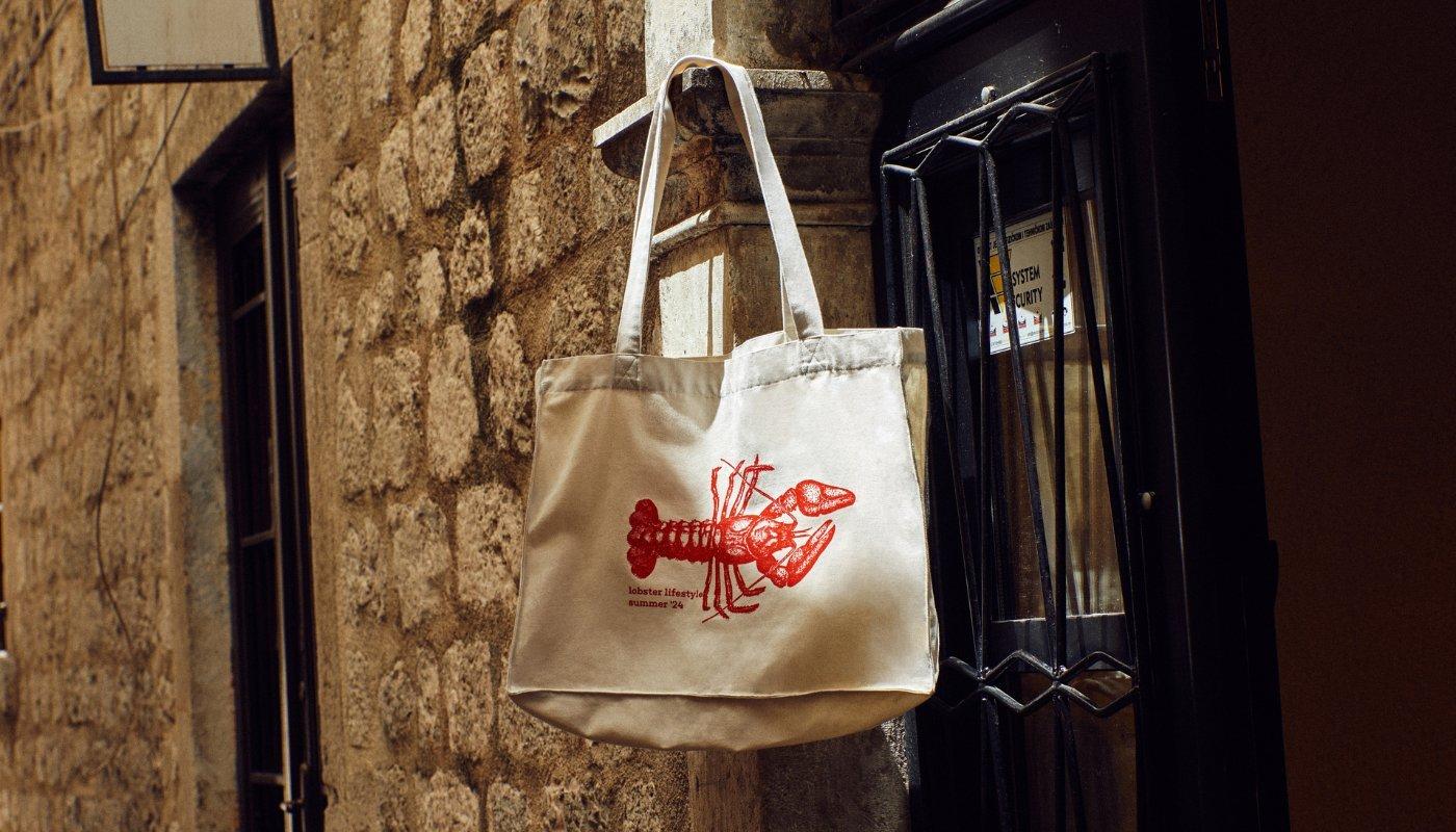 canvas tote bag with a nautical lobster design